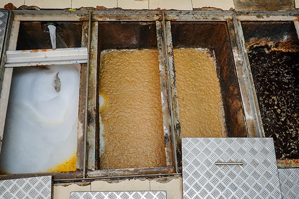 grease trap maintenance prevents grease and other contaminants from entering the sewer system, which helps protect the environment